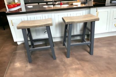 Kitchen bar area with two wooden stools